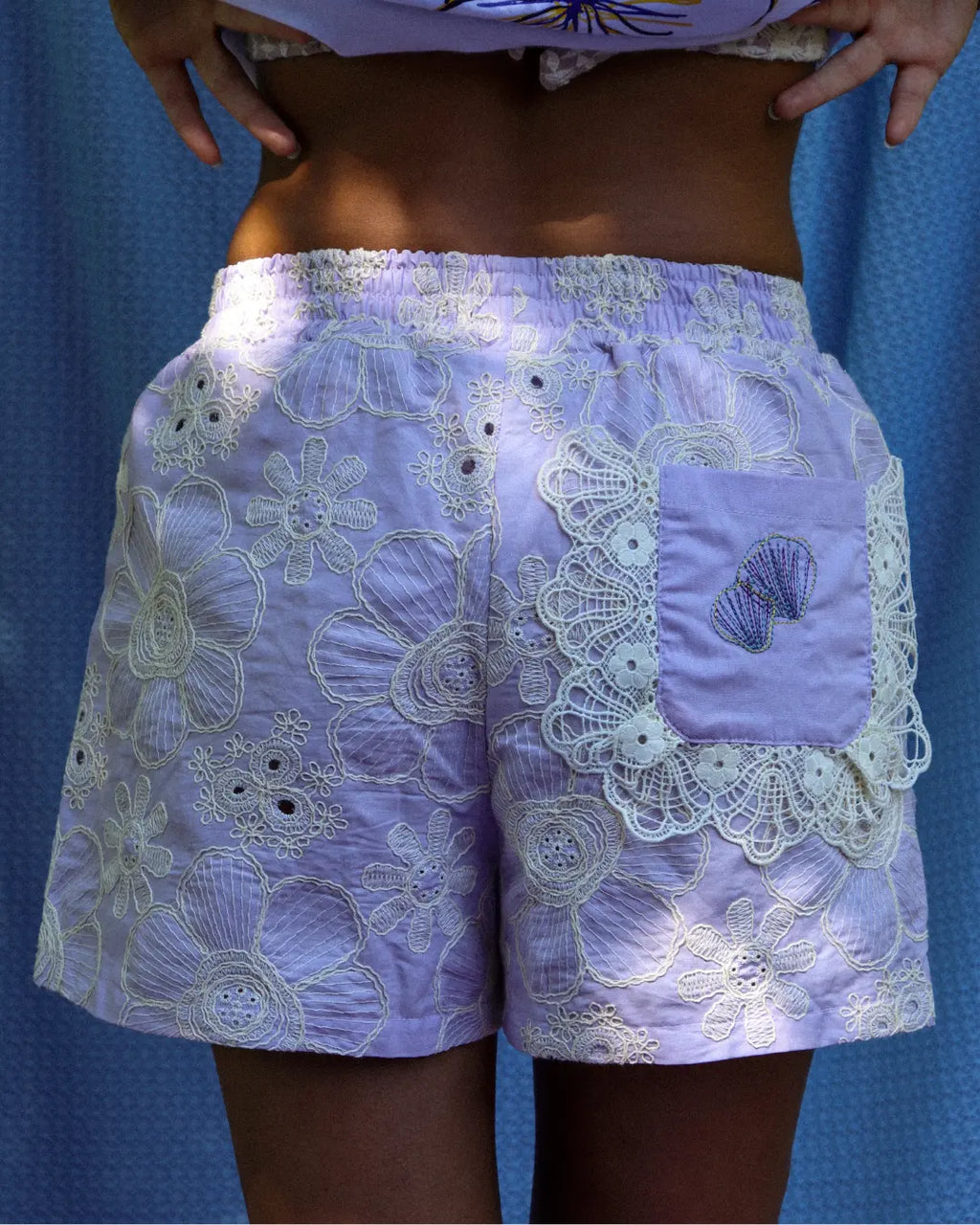Shorts Maré Corais Lilás